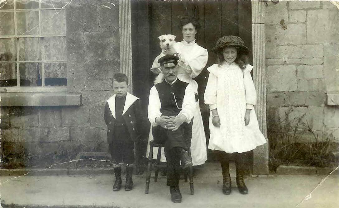white-family-in-front-of-3a-greendown-cottage-albert-white-his-second-wife-florence-their-son-frank-also-gladys-white-from-alberts-first-marriage-to-mary-stennard