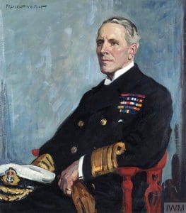 Admiral Sir R H Peirse, KCB, KBE, MVO : 1920 (Art.IWM ART 3056) image: A half length portrait of Peirse, seated and wearing full uniform, with his cap resting on his thigh. Copyright: © IWM. Original Source: http://www.iwm.org.uk/collections/item/object/38018