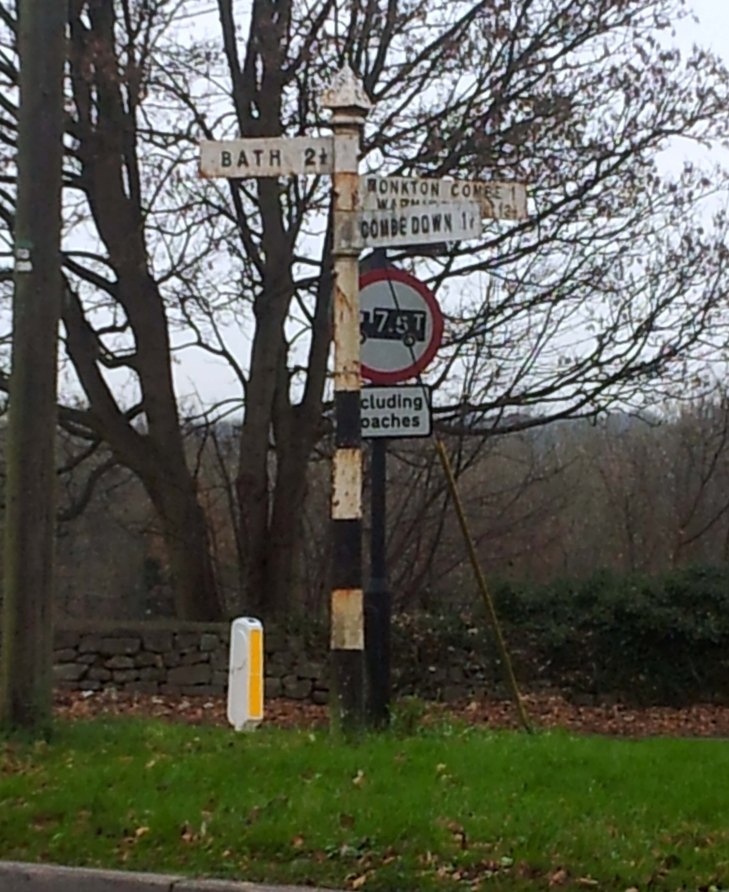 Somerset County Council signpost at the top of Brassknocker Hill